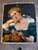 Striking figurative oil painting depicting an elegant young woman seated before a dark background, dressed in a rich teal-...
