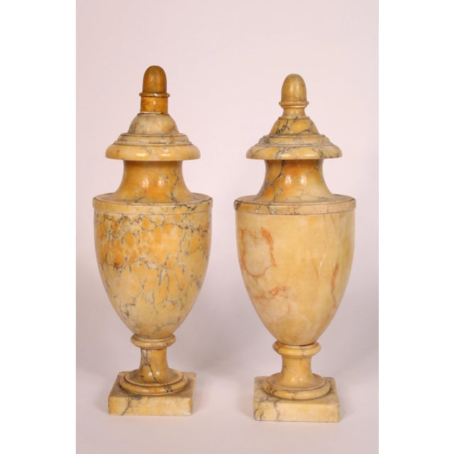 Pair of Sienna Marble urns, circa 1930's.