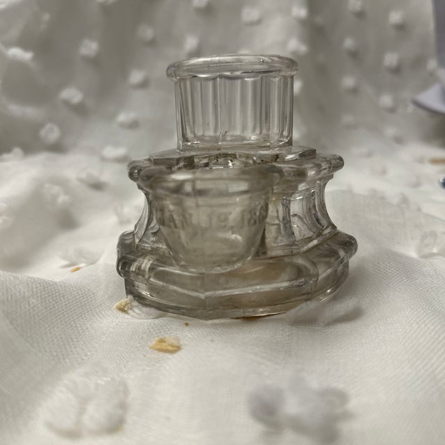 This ink well is unique due to it being dated with a PAT. dated January 19,1869.It is in excellent condition for its age.
