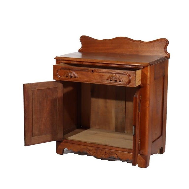 Antique Victorian Walnut Washstand With Backsplash & Carved Pulls C1900 Measures - 34 1/2" x 30" x 16 3/8" A finely...
