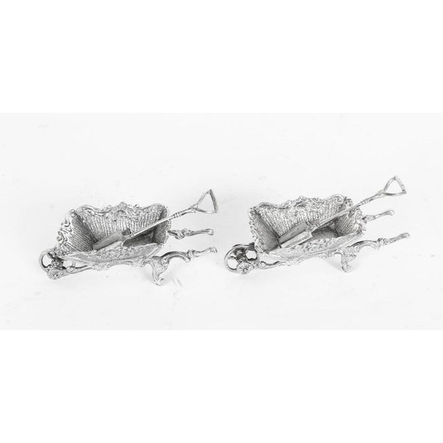 This is a charming pair of antique French silver novelty table salt condiments in the form of garden wheelbarrows, dating...