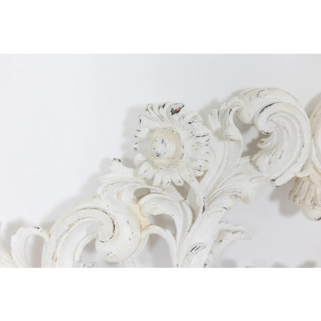 Rocaille style headboard, in carved, openwork and white lacquered wood. Work from the South of France or Italy. French...