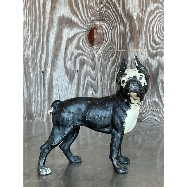 Add vintage charm and a touch of whimsy to your space with this Vintage Boho Patinated Wrought Iron Dog sculpture. Modeled...