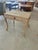 An elegant and richly patinated 18th century provincial French side table or writing table, beautifully bleached to reveal...