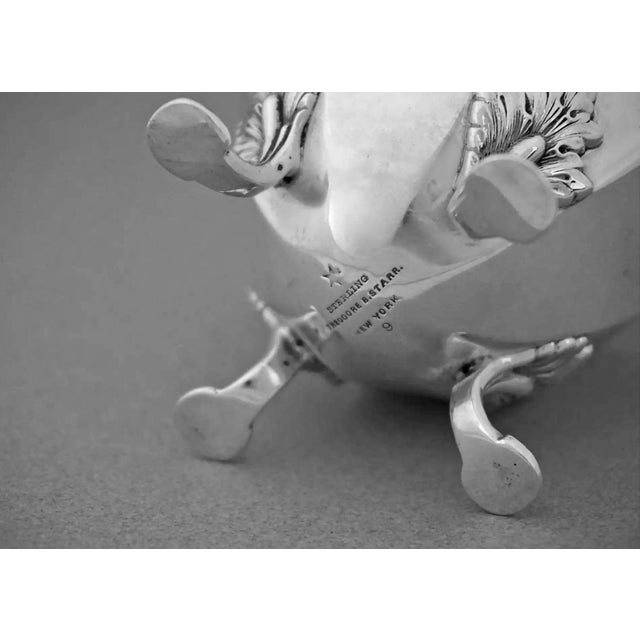 This elegant American sterling silver sugar caster, or muffineer, was made by Theodore B. Starr of New York and reflects...