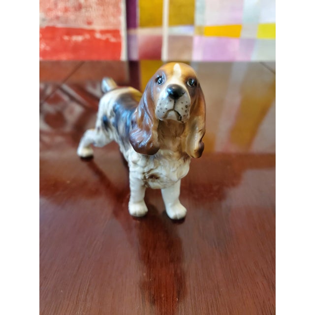 A very fine antique original hand painted dog porcelain sculpture. Having a sweet loving expression with piercing eyes...