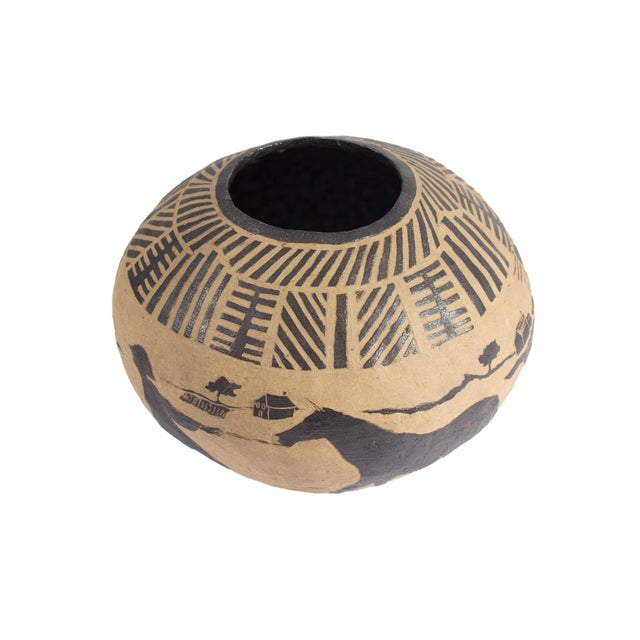 A 1976 studio pottery vessel by the American ceramic artist Marilyn Andrews (1942-2019). This whimsical vessel has a...