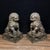 This is a striking pair of vintage bronze guardian lion statues, traditional symbols of protection and good fortune. The...