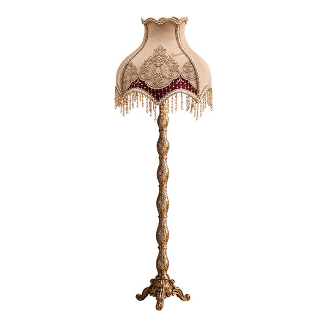 French-Style Gilded Floor Lamp – Ornate Gold Leaf Stand With Embroidered Burgundy & Ivory Shade For Sale