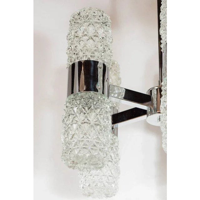 This gorgeous Mid-Century Modernist chandelier by Kinkeldey has a chrome five-arm design emanating from a center point,...