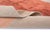 Three warm color blocks — terracotta, rust, and clay — float against a soft neutral beige ground, stacked like sunbaked...
