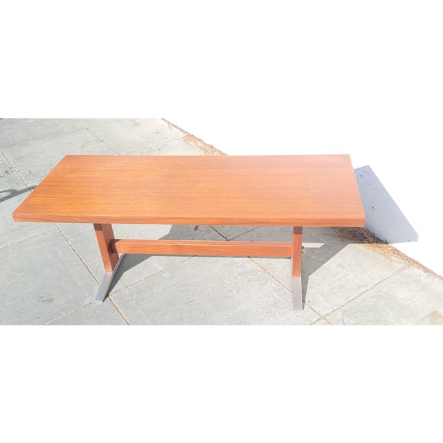 A nice Retro Danish Teak Mid Century Coffee table. Has space age Aluminum Feet! From Denmark in 1960s.