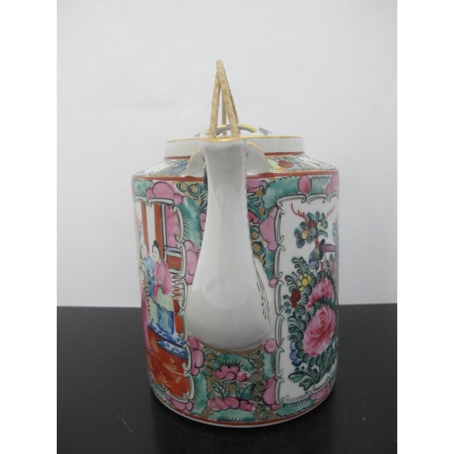 Vintage Chinese Export Rose Medallion porcelain teapot, featuring alternating panels of figural court scenes and floral...