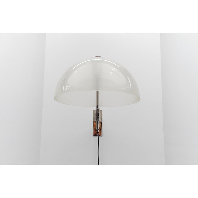 Mid-Century Modern wall lamp Bamboo and rattan wickerwork, 1960s Italy The lamp is executed with 1x E27 Edison screw fit...