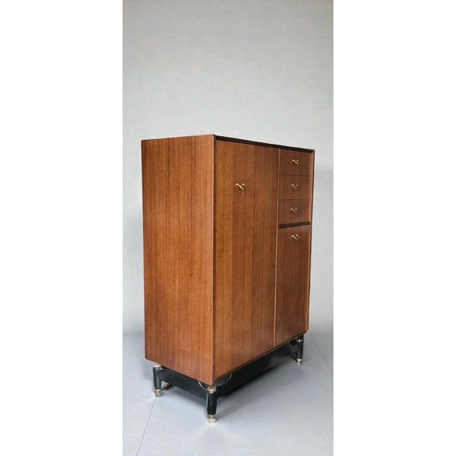Tola & Black Series G-plan Chest of Drawers/Wardrobe Teak wardrobe opening to reveal a hanging rail on the left and...