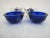 Pair of Reed & Barton sterling silver pedestal salt cellars with cobalt glass liners. Excellent condition, one liner has a...