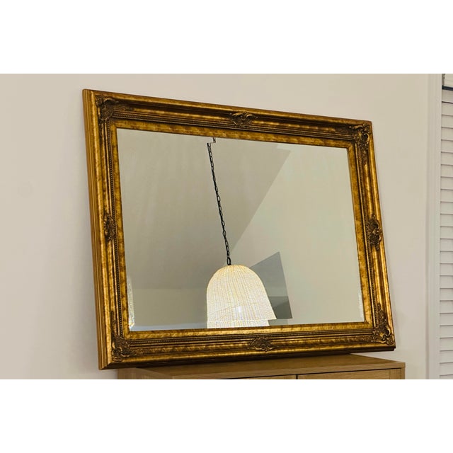 Add a touch of French elegance to your space with this stunning Louis XVI style mirror. The frame features intricate...