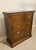 This petite Chippendale-style secretary chest produced for Marshall Field's features a unique flip-top which raises a...