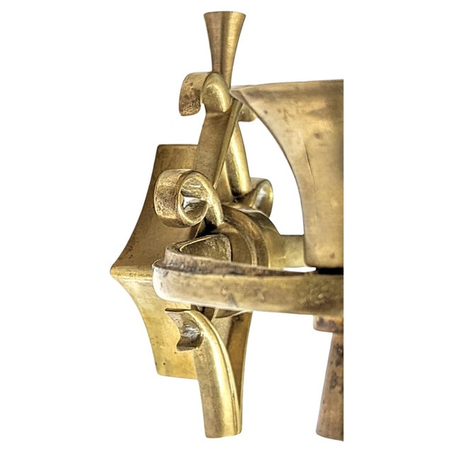 Superb pair of French Art Deco double arms brass wall sconces by Jules Leleu 1940's. Each sconce accommodates two...