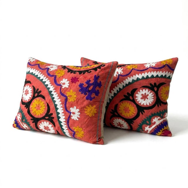 This beautiful 22'' x 26'' hand-embroidered Suzani pillow cover set was made from authentic Uzbek cotton fabric. The...