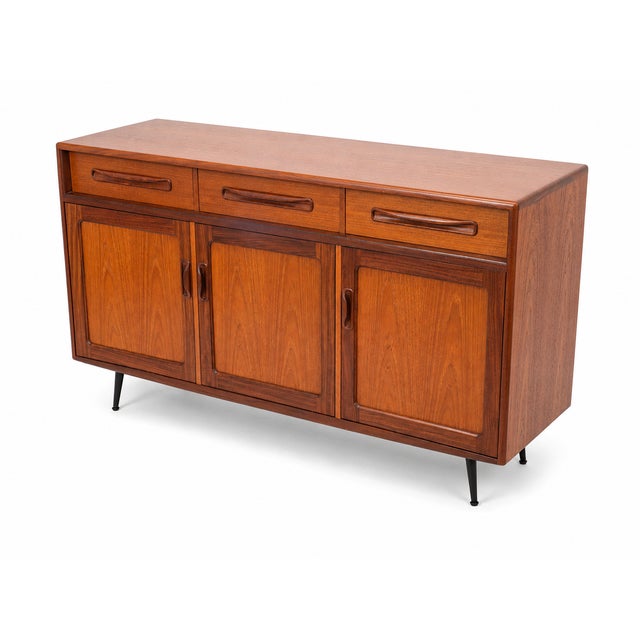 A striking G-Plan Fresco mid-century teak sideboard, fully restored to revive its rich timber tones and distinctive...