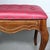 French Louis XV style ottoman or stool in a pink tufted upholstery. Wonderful vinatge condition. 21”W x 17.5”D x 18”H