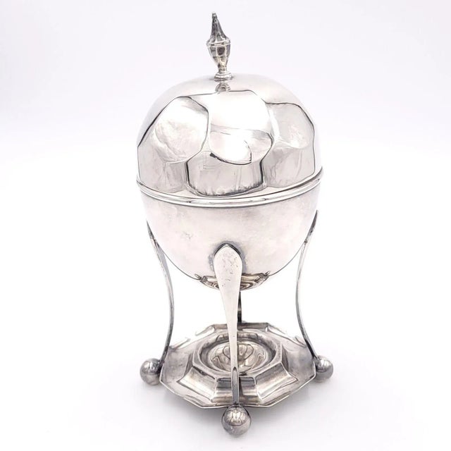 A vintage silver plate egg holder, England circa 1960.
