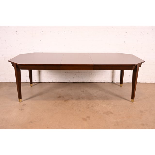 An exceptional French Regency Louis XVI style extension dining table By Henredon USA, Early 21st Century Book-matched...