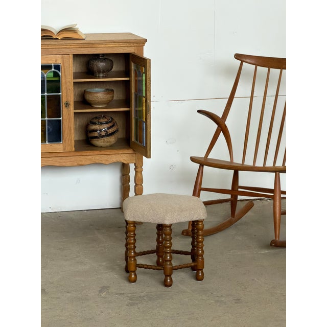 Model IW3 rocking chair by Danish designer Illum Wikkelsø, designed in 1958. The chair has a light, open construction with...