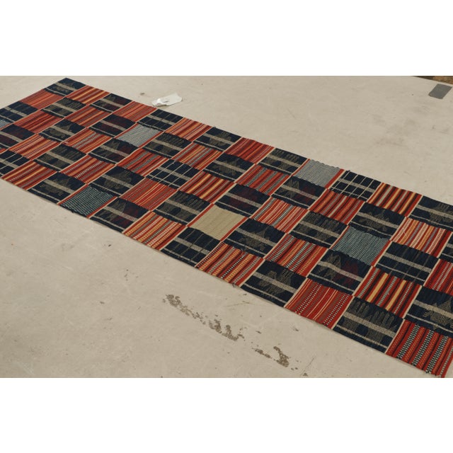 Originating From China, This Contemporary Runner Is Hand Knotted With Durable, High Quality Wool Depicting A Patchwork...