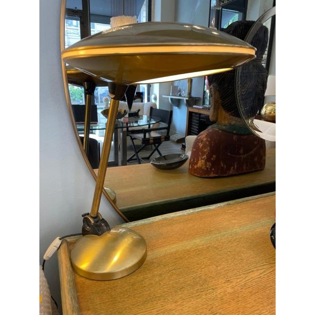 50s Vintage Space Age style brass table lamp, often attributed to the French manufacturer Aluminor and known as the "UFO"...