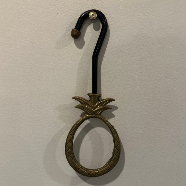 Vintage brass pineapple shaped damper pull. A took for the fireplace.