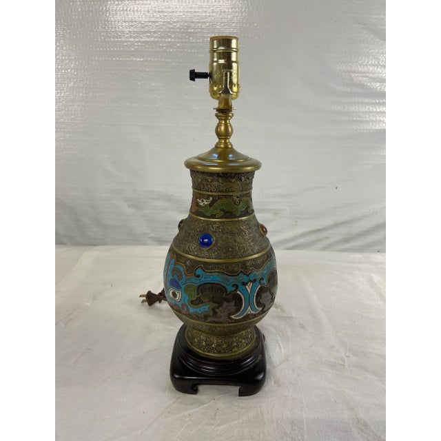 Antique Asian brass cloisonné vase mounted as a lamp.