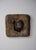 Excavation 2 presents a textured, organic form that appears to emerge from a weathered surface, evoking a sense of ancient...