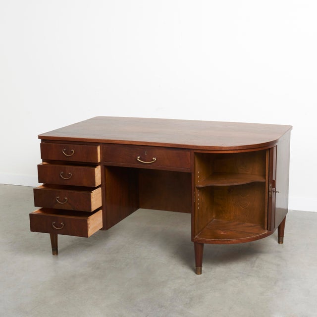 Midcentury danish design desk with bar. Walnut with capped legs and brass pulls.