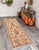 Enhance the ambiance of your home with this magnificent Persian-influenced Turkish hand-knotted rug made by skilled...
