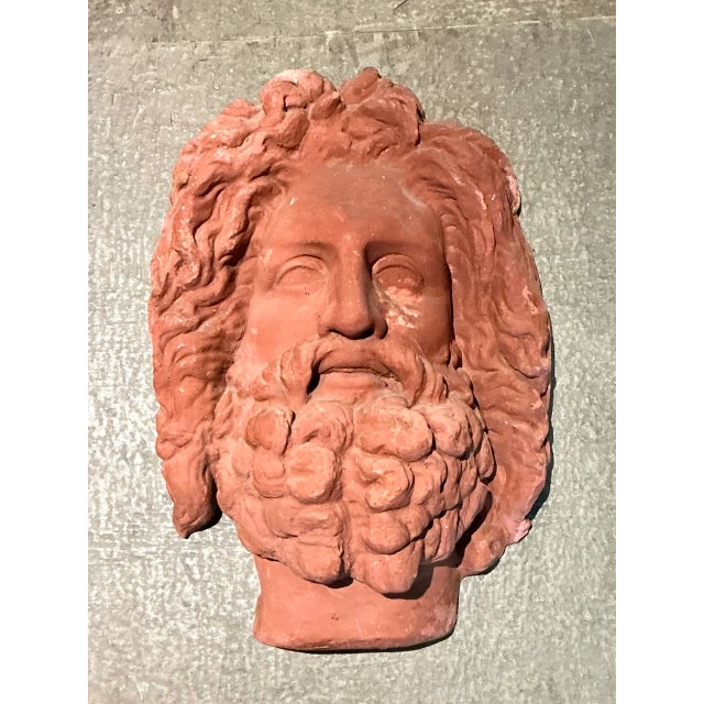 This vintage terracotta wall sculpture channels neoclassical grandeur, portraying a bearded male figure reminiscent of...