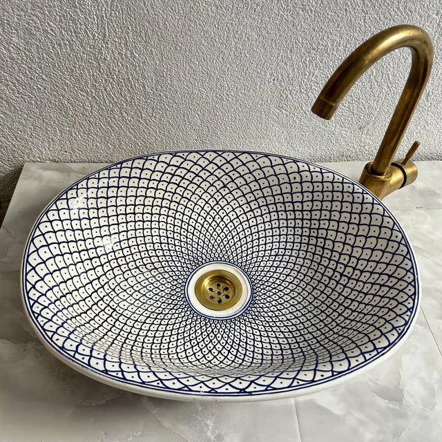 Transform Your Bathroom with Our Handcrafted Blue Oval Sink Elevate your bathroom with our 18-inch blue oval sink,...