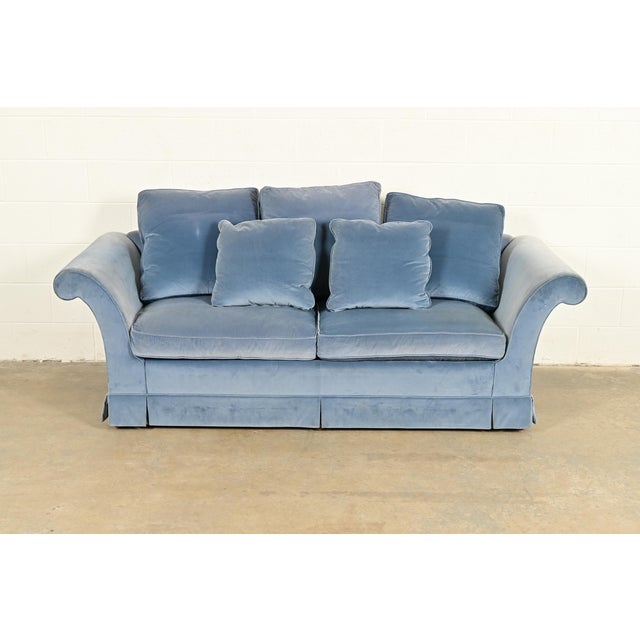A gorgeous traditional velvet upholstered roll arm sofa or loveseat By Baker Furniture USA, Circa 1980s Measures: 86"W x...