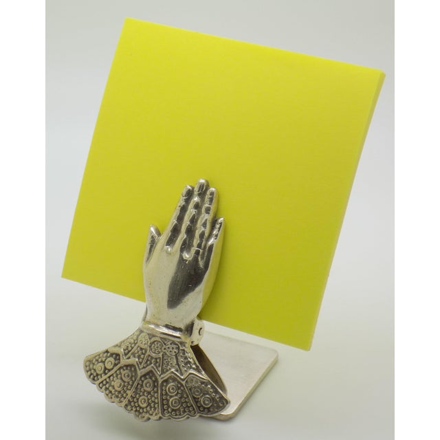 Handcrafted in Florence, Italy, during the 1970s to 1980s, this solid 800 continental silver figural hand clip brings...
