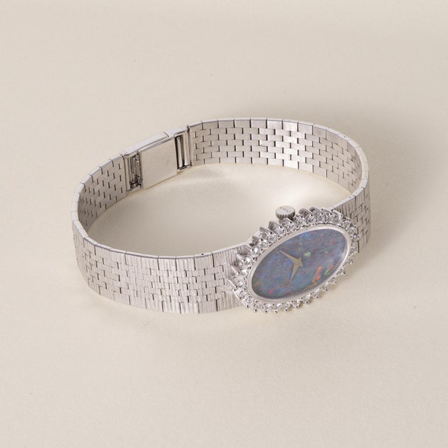 Vintage Chopard L.U.C Chopard & Cie luxury timepiece in 18K white gold with an oval opal dial and diamond bezel, circa...