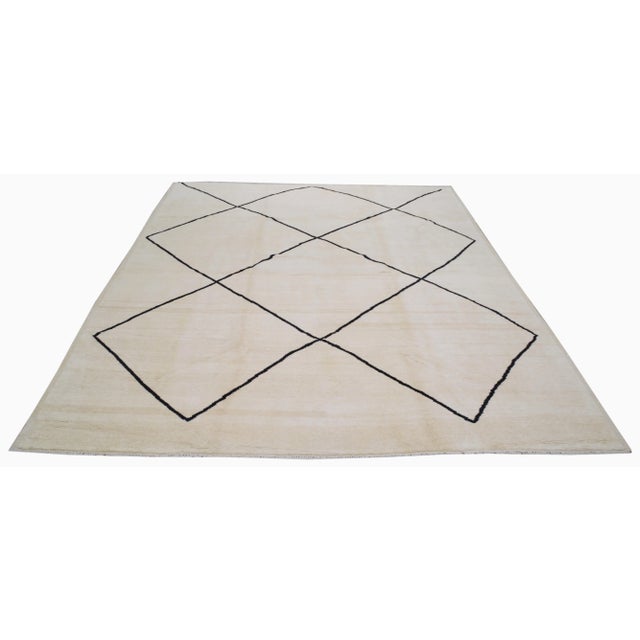 Contemporary Moroccan hand knotted rug with soft wool texture.