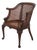 Vintage French Carved Cane Tub Chair For Sale