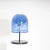 Manufactured on a round black metal stand standing table lamp with a large bell-shaped glass shade in blue in millefiori...