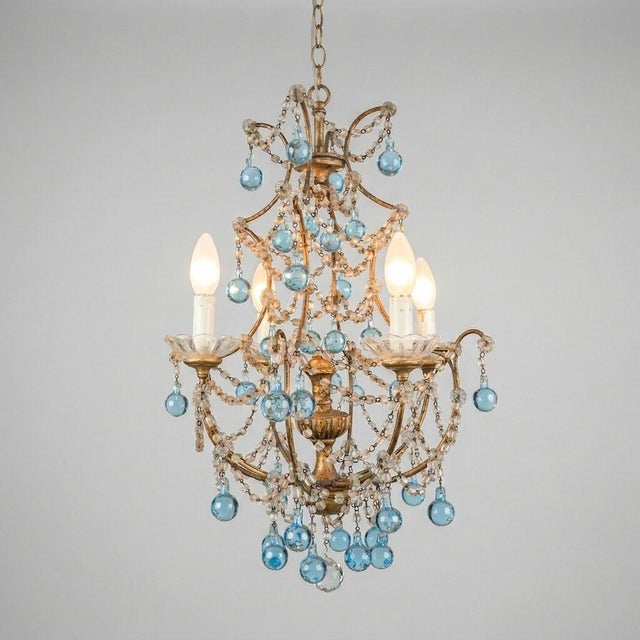 Full of charm and lightness, this basket-shaped chandelier, also known as a "cage," is an Italian creation from the 1960s,...