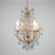 Full of charm and lightness, this basket-shaped chandelier, also known as a "cage," is an Italian creation from the 1960s,...