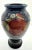 This is a William Moorcroft studio pottery pomegranate vase that measures 9" tall and 4.5" wide. Marked with Moorcroft...