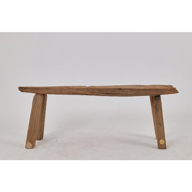 Introducing our exquisite reclaimed oak bench, a testament to timeless craftsmanship and sustainable design. This rustic...