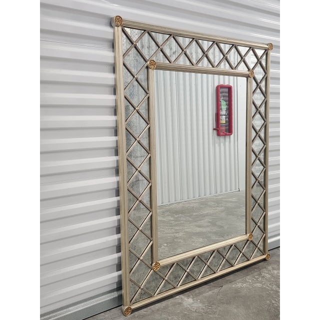 Vintage Hollywood Regency style Drexel Heritage large silver gilt eglomise antiqued Mirror. It features a silver gilt...