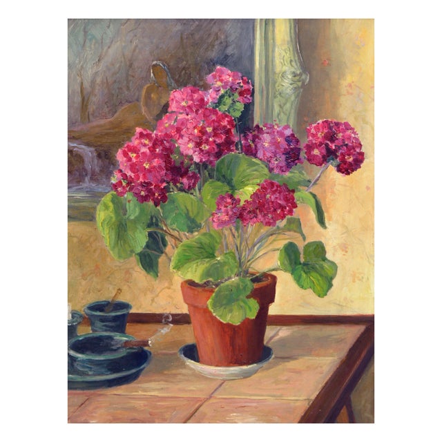 Unique still life of a table with geraniums and a lit cigar, with a framed painting of a nude in a forest setting in the...